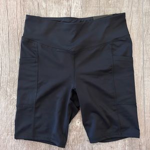 7 inch biker shorts with side pockets. Unworn and tags still on